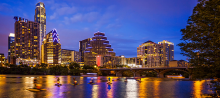 Skyline of the city of Austin, lit up at dusk