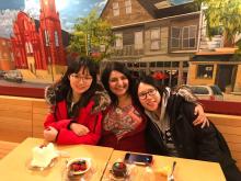 International Friendship Program participants bond over dinner at a restaurant