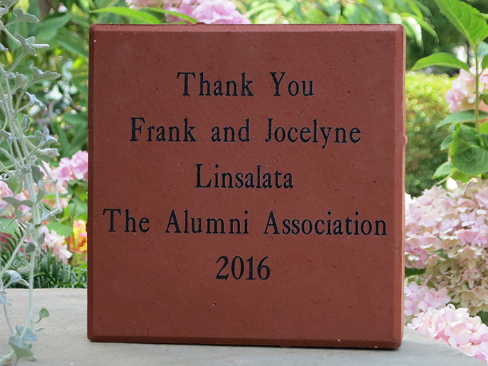 Photo of engraved paver stone which says, "Thank You Frank and Jocelyne Linsalata The Alumni Association 2016"