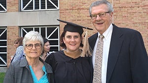 Case Western Reserve University senior director of alumni relations Kate McCreary at graduation with her parents.