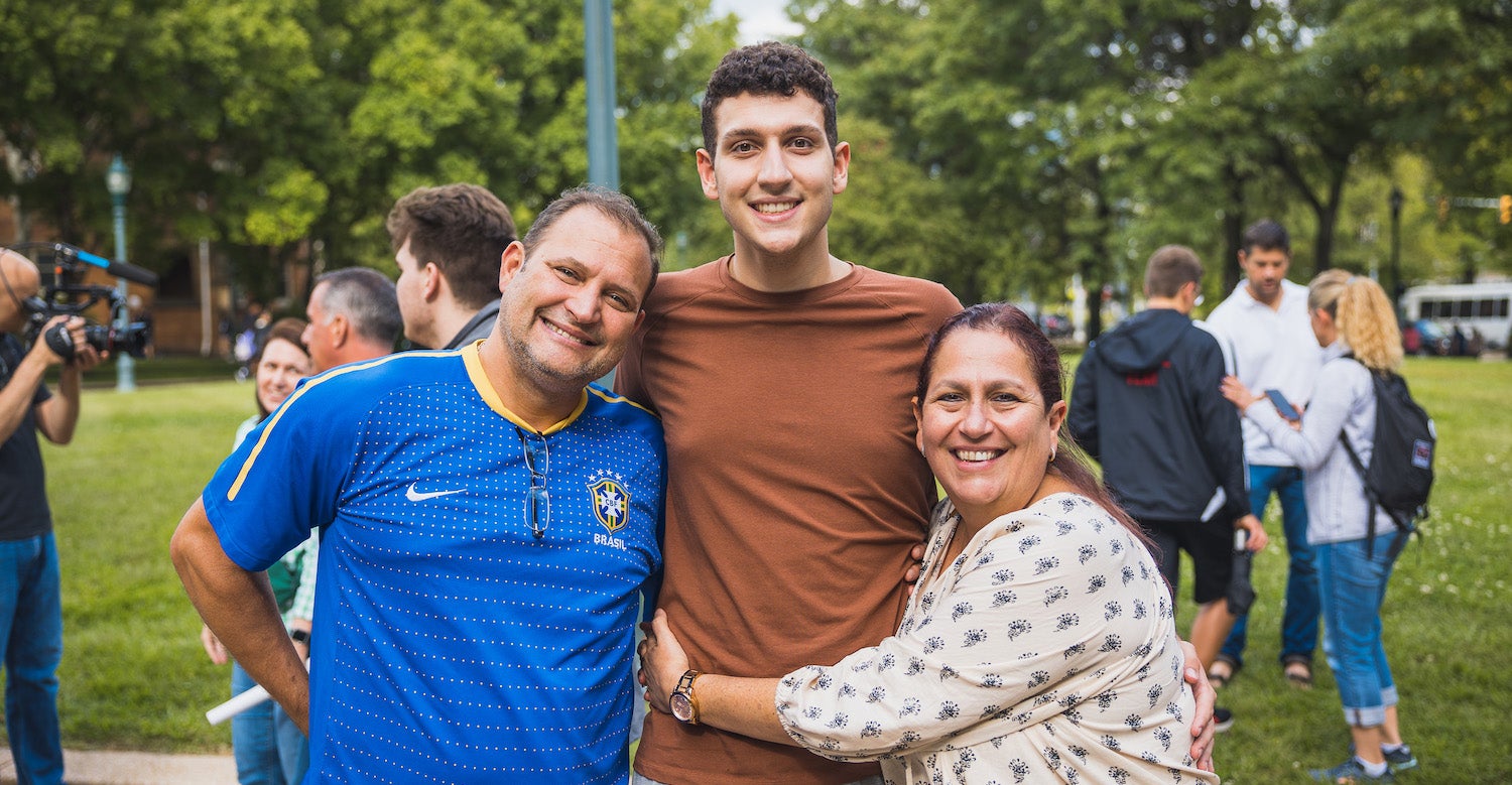 Parents pose with their CWRU student