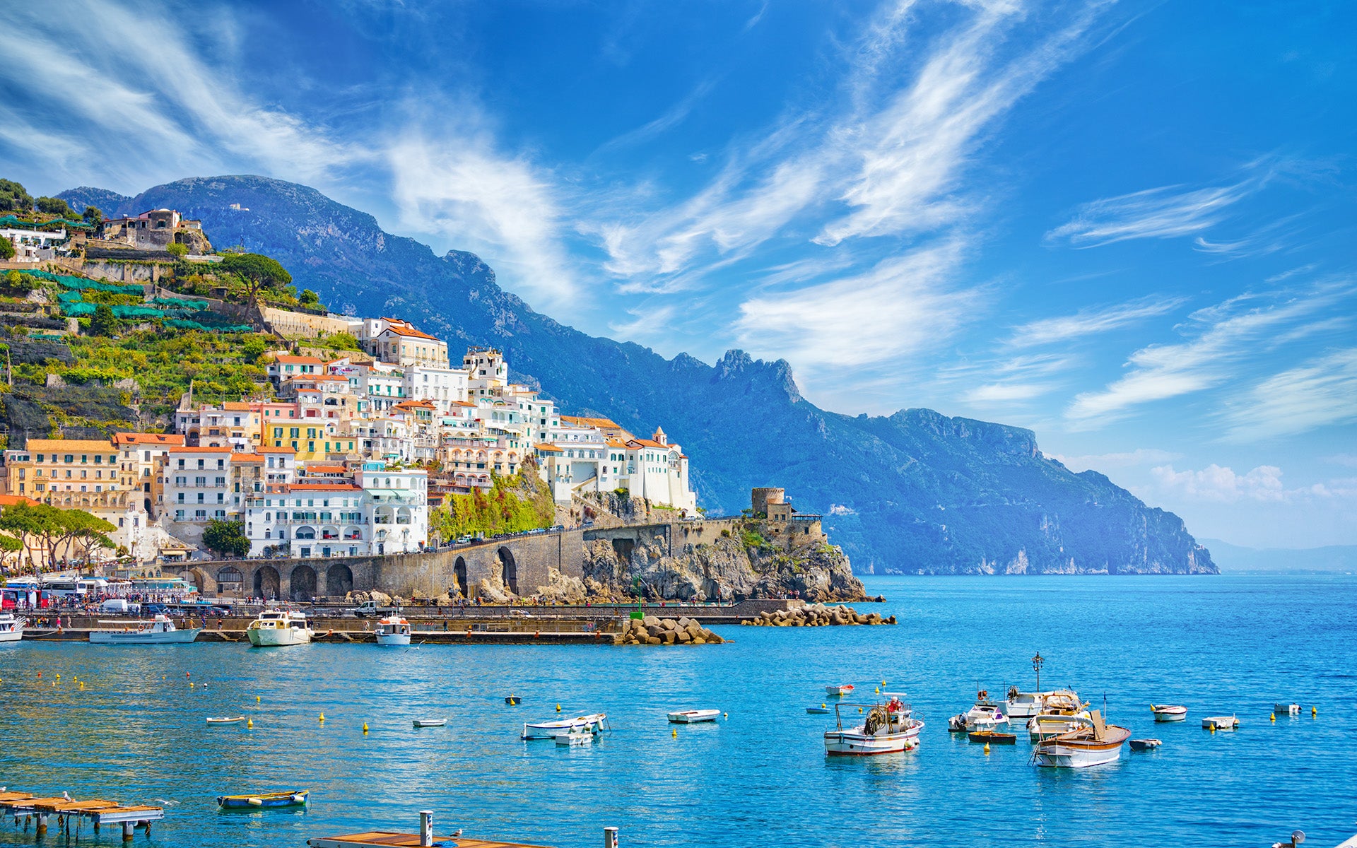 View of houses along the Amalfi Coast with boats in the water