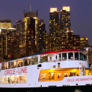 Circle Line Manhattan ship in front of the New York City skyline at night