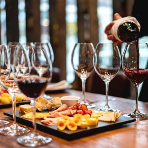 Wine glasses and charcuterie board on a table