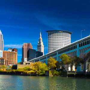 Cleveland skyline shown in the daytime by the water