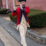 Vincenzo Volpe plays fife in military band uniform