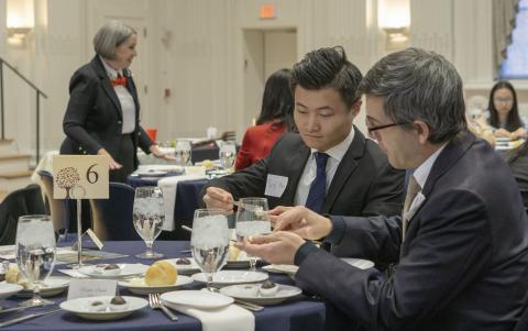 CWRU international students learn about US formal dining etiquette during a dinner at Linsalata Alumni Center 