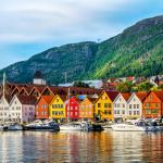 Norwegian buildings on a coastline in the daytime