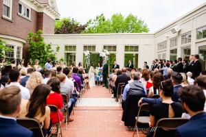 A wedding outside in the patio of the Foster-Castele Great Hall