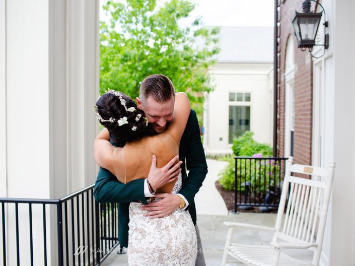 Bride hugging guest
