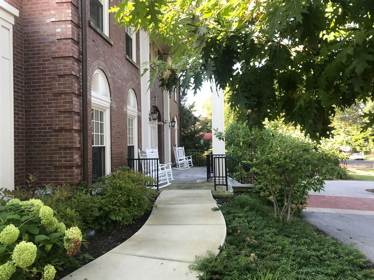 Rocking chairs on the front porch of the The Linsalata Alumni Center 