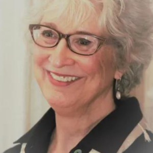 smiling woman with glasses