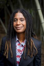  Woman with dreadlocks smiling at camera