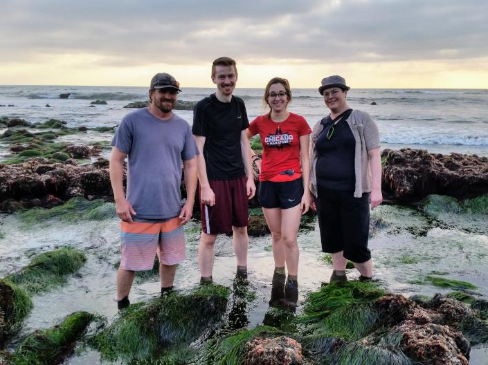 Chiel lab members collecting sea slugs at the beach