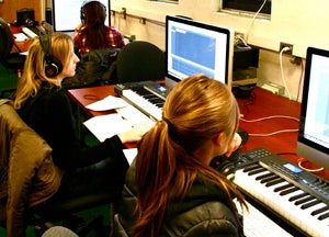 CWRU Students working with in the computer lab