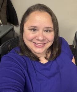 Jennifer Wright Photo, Woman with brown hair in purple shirt