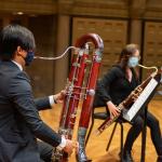 Bassoon students play masked at the Maltz Performing Arts Center