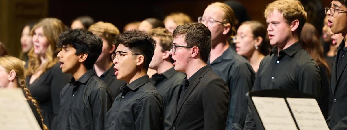 Photo of concert choir performing on stage at Maltz on 10-14-2024.