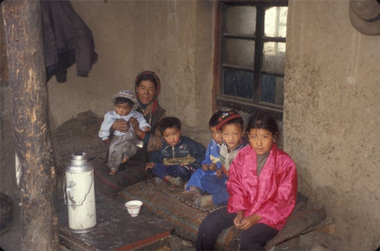 Picture of a a Tibetan mother and five childre