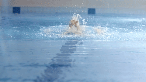 swimmer doing the breast stroke in slow motion