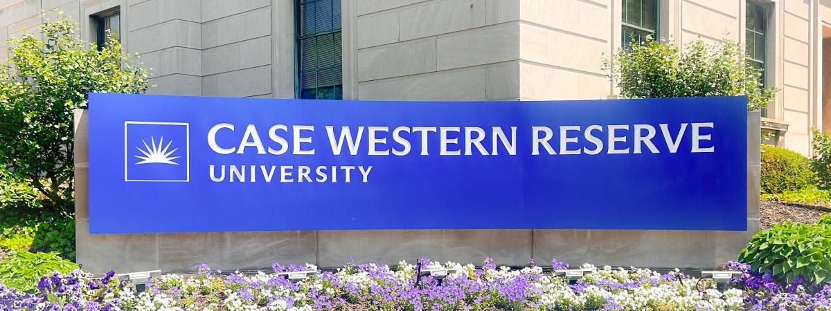 The image features a blue sign with white verbiage that reads: “Case Western Reserve University."