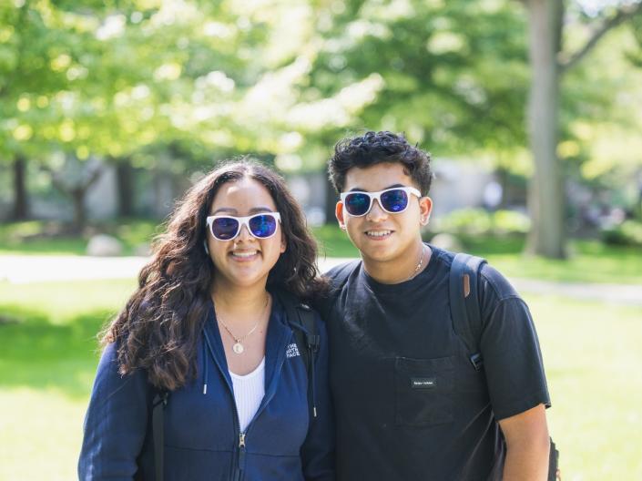 CWRU students smiling and posing for the camera.