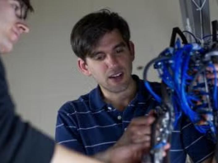 student working in robotics lab