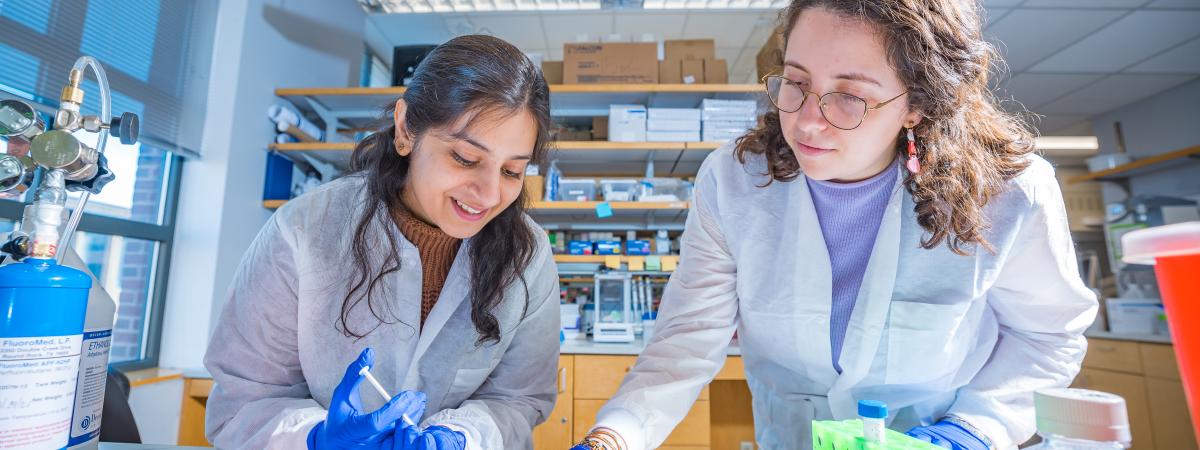 Aayushi Laliwala, left, postdoctoral scholar and lab manager of the Exner Lab and Tessa Kosmides, PhD candidate in biomedical engineering at Case Western Reserve University.