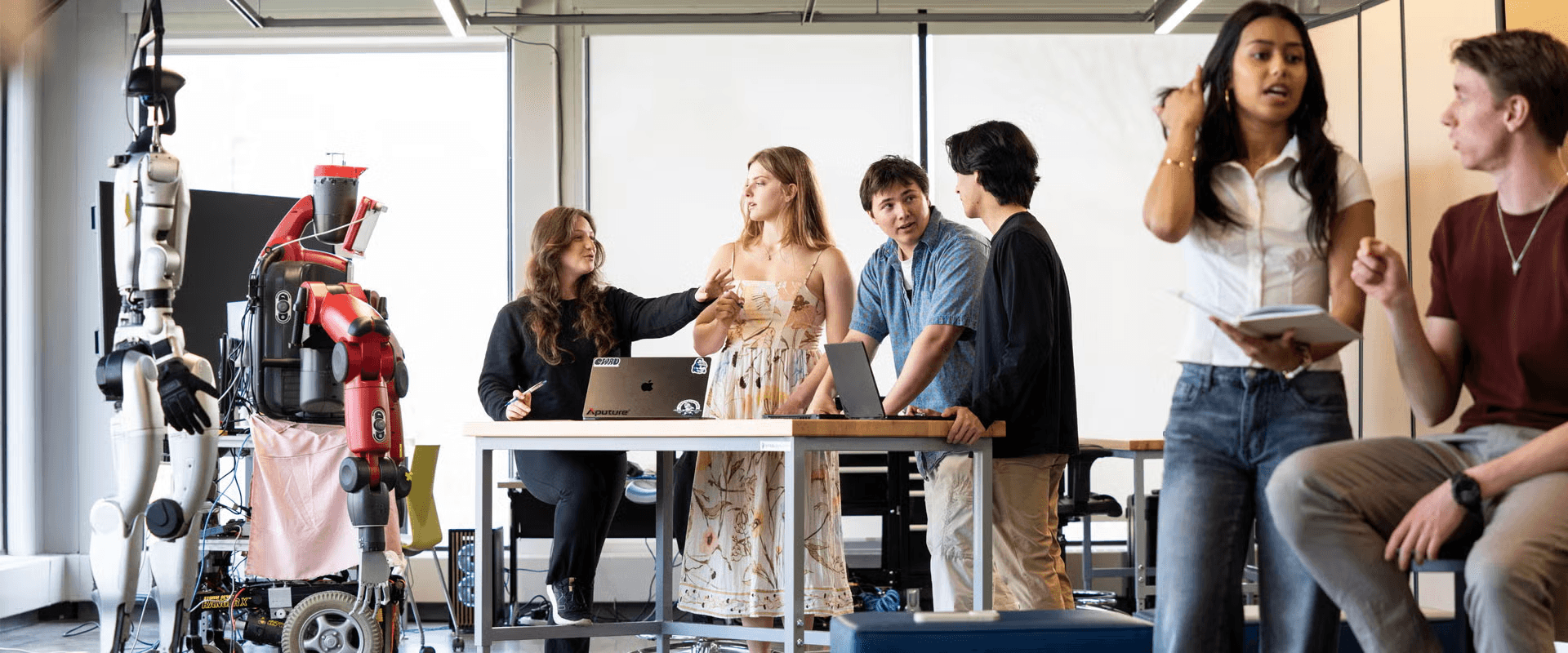 Students working in a bright studio space at Case Western Reserve University