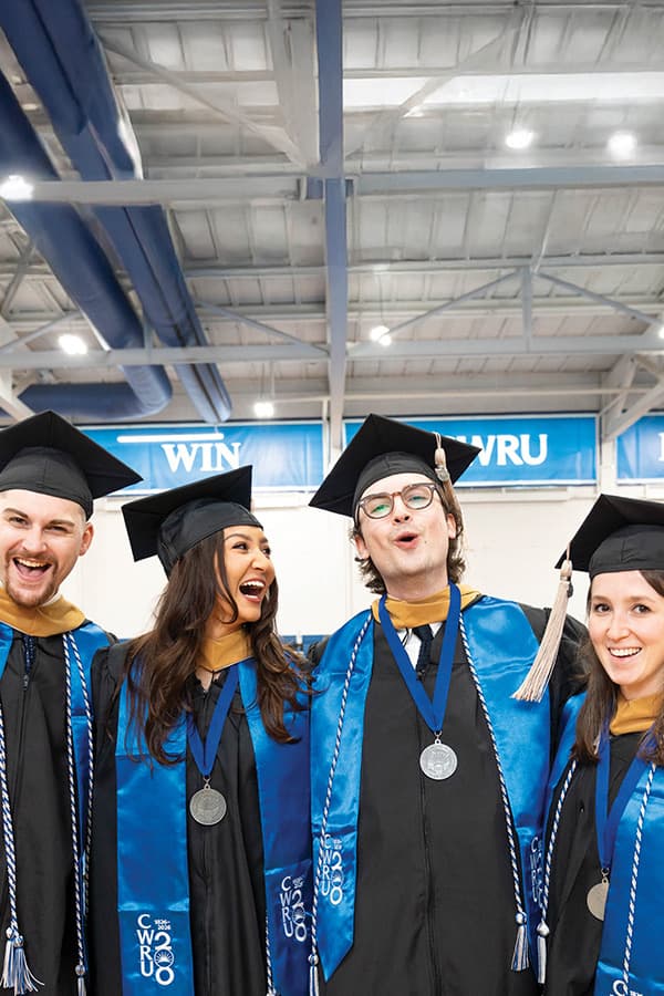 Weatherhead School of Management students in caps and gowns