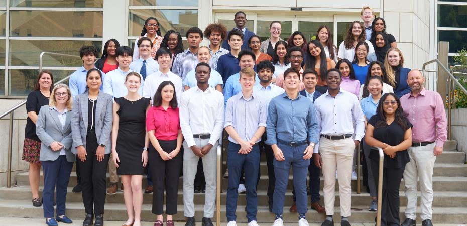 2023 CanSUR students posing for a picture on the steps in front of the WRB