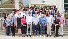 2023 CanSUR students posing for a picture on the steps in front of the Wolstein Research Building