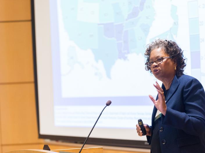 Photo of Lucille Adams Campbell presenting at the 2018 Cancer Disparities Symposium