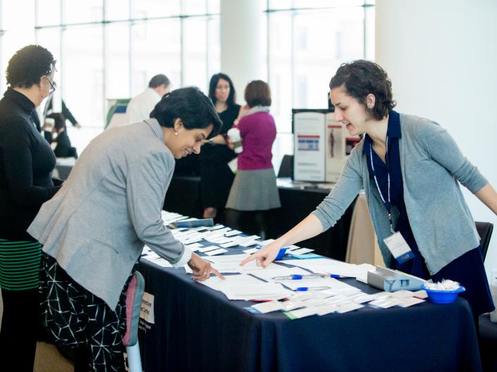 Photo of registration desk at a cancer center event