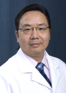 William Tse in white labcoat