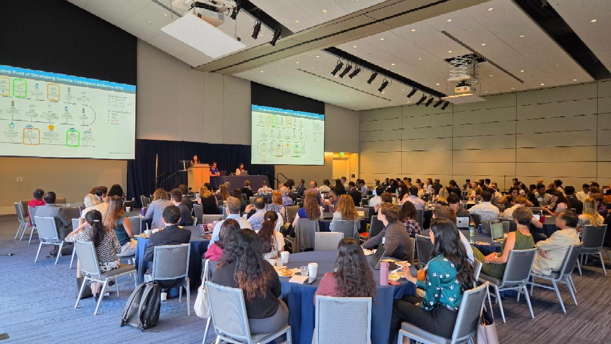 Attendees gather for a presentation during the Cellular Plasticity and Tumor Ecosystem Conference hosted by Case CCC.