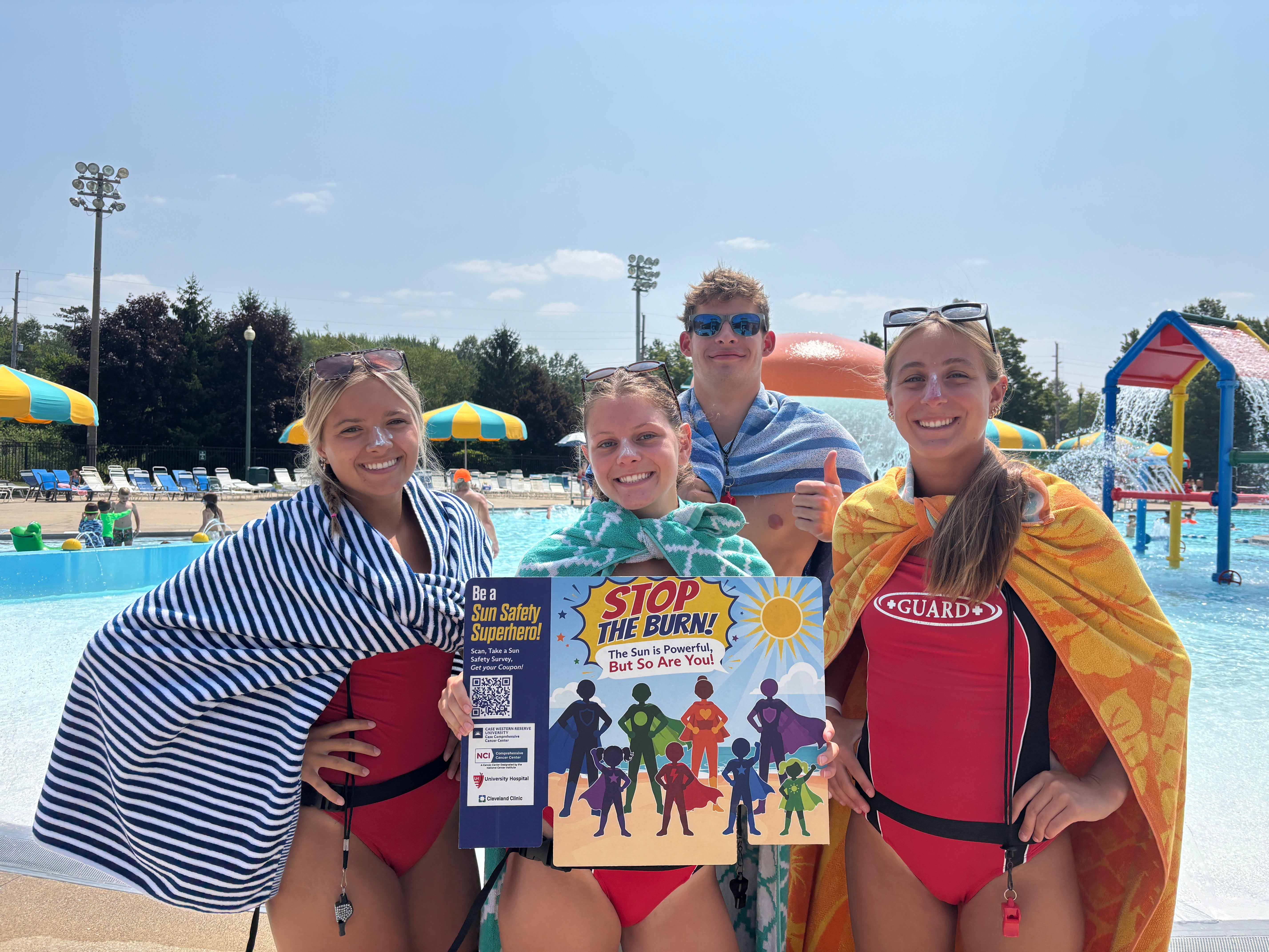 Lifeguards at Mayfield Village Having Fun with Stop the Burn Super Hero Theme