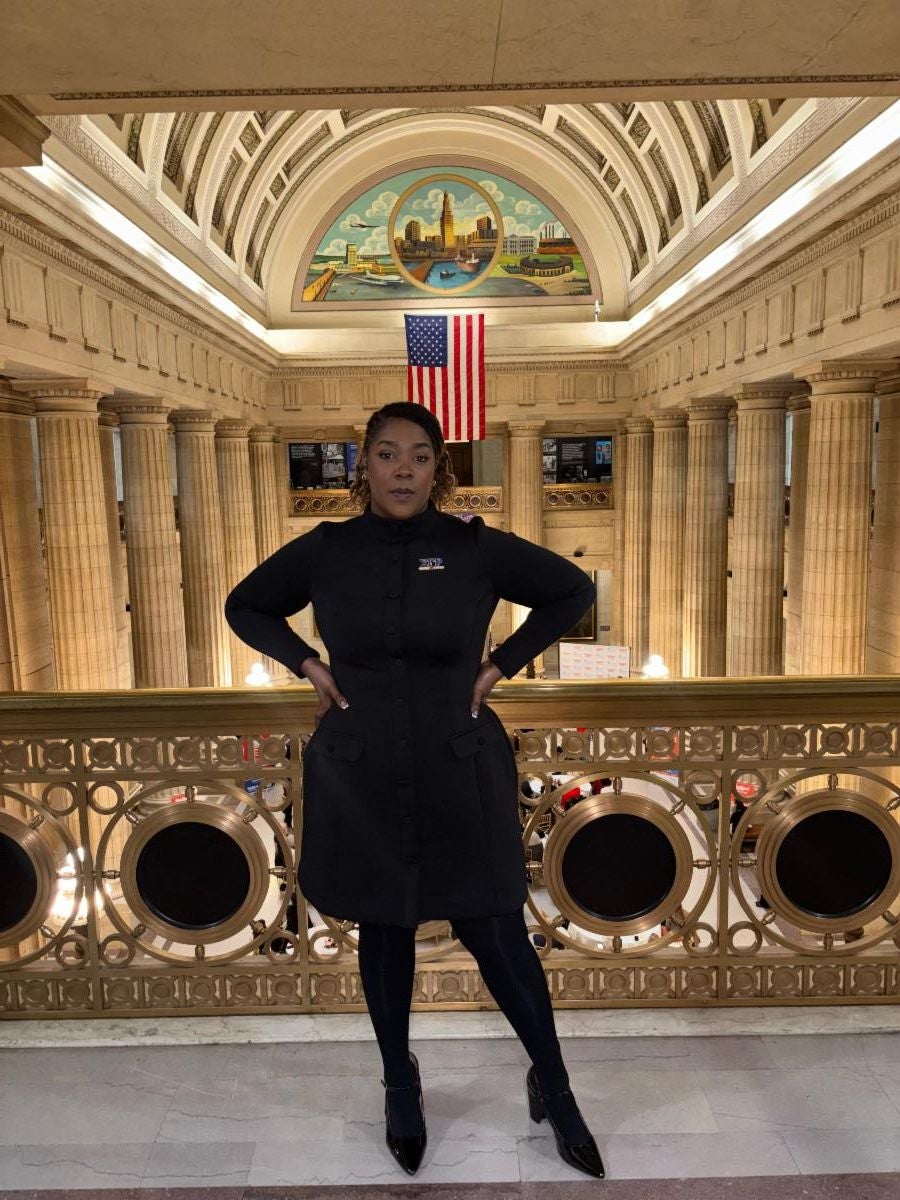 Sydney Evans, MSW, C-CHW, stands inside Cleveland City Hall following her appointment to the Cleveland Commission on Black Women and Girls.