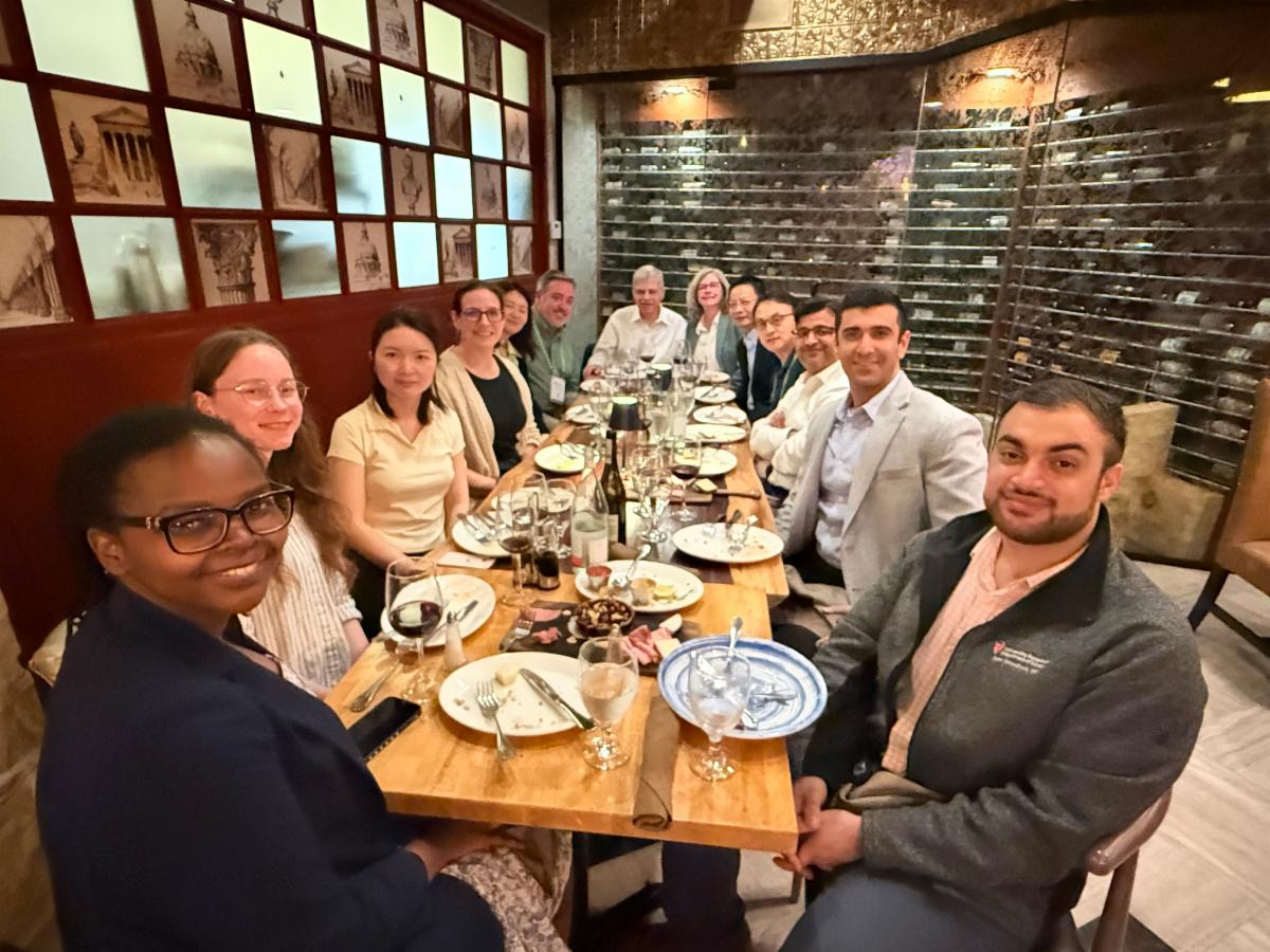 Case Comprehensive Cancer Center members and colleagues gathered around a restaurant table during AACR 2026 in San Diego, reflecting the collaborative spirit of the Case CCC community.