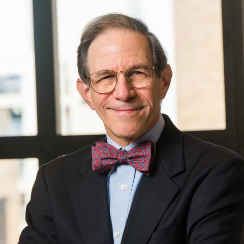 Portrait of Sanford Markowitz. Smiling man in suit jacket with bowtie