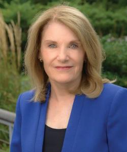 headshot of Claudia J. Coulton