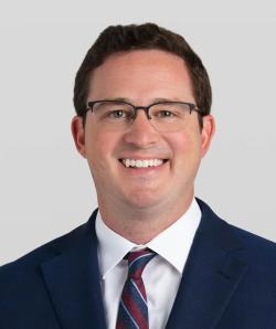 A headshot of Andrew Trunk