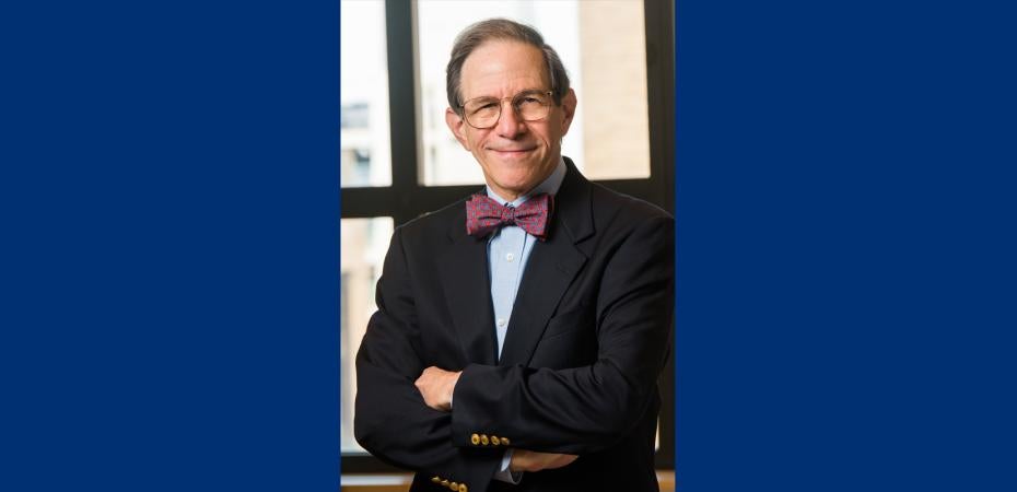Portrait of Sanford Markowitz. Smiling man in suit jacket with bowtie