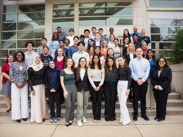 2024 CanSUR cohort standing on steps outside WRB