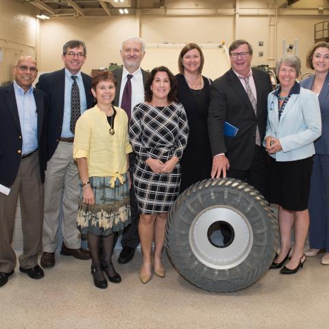 CWRU research leaders posing for a group photo in the SLOPE Lab at the NASA Glenn Research Center.