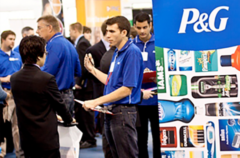 P&G representative speaking with a person at an event