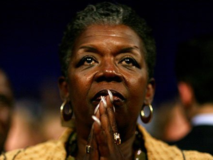 Congresswoman Stephanie Tubbs Jones, hands clasped together