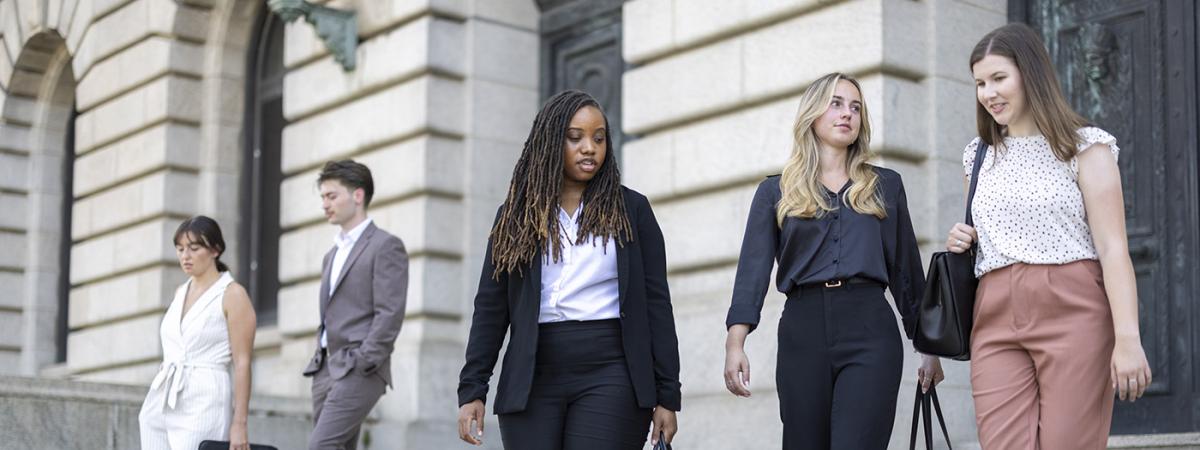 Law students collaborating with industry professionals
