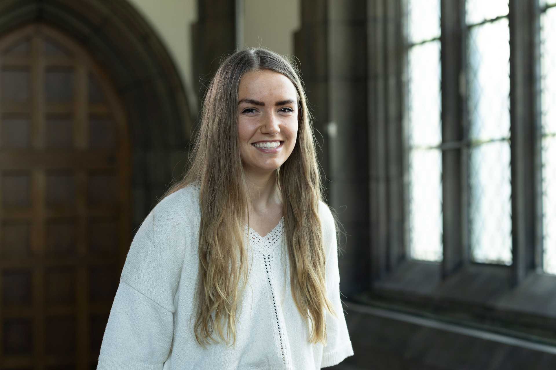 Portrait of Case Western Reserve University student Zoe Sekyonda in Amasa Stone Chapel