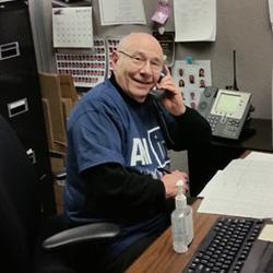 An alumni member answering the phones
